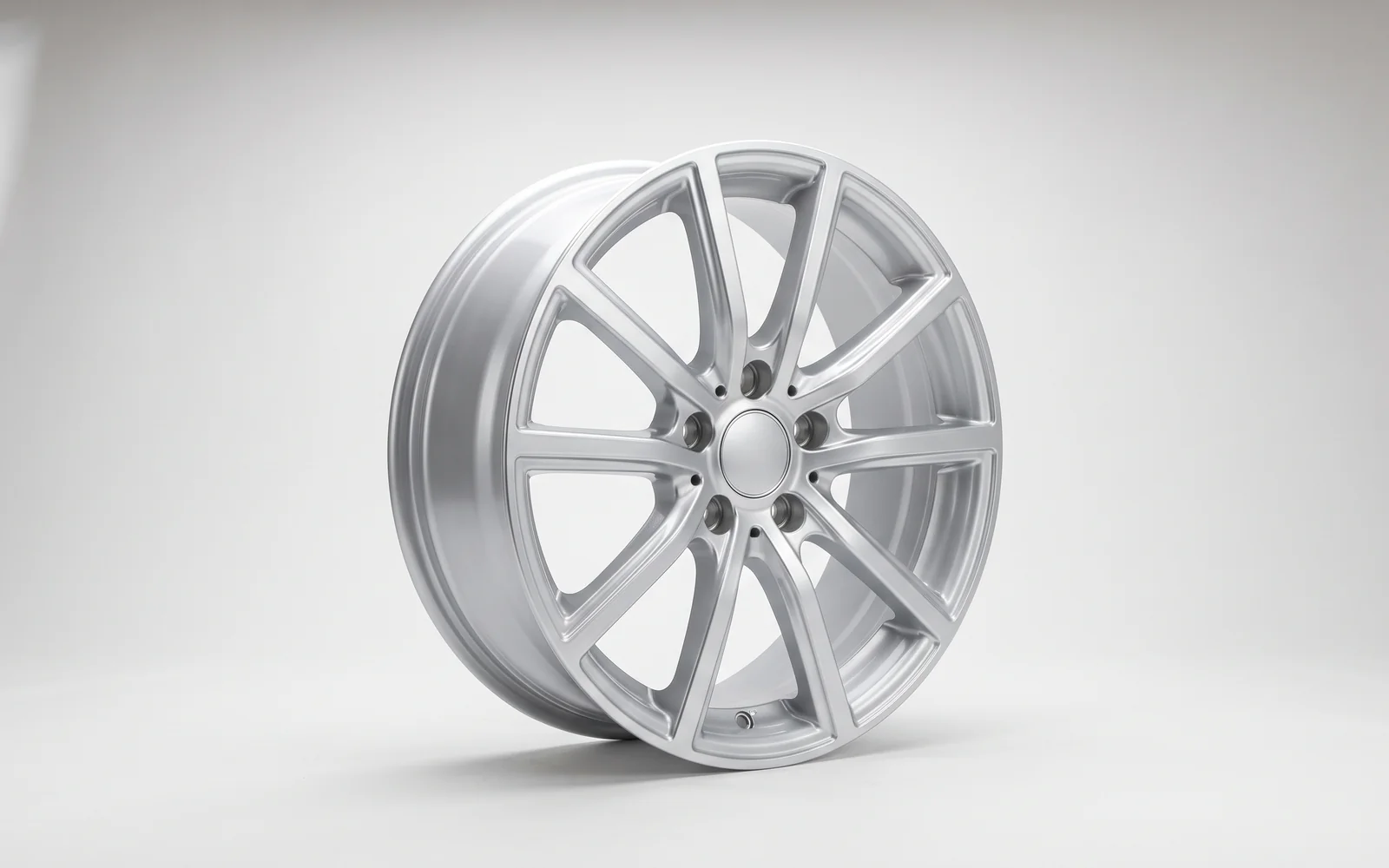 A silver multi-spoke alloy wheel